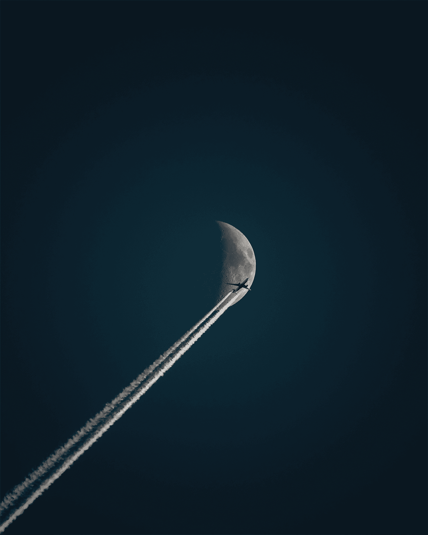 The plane crosses the moon