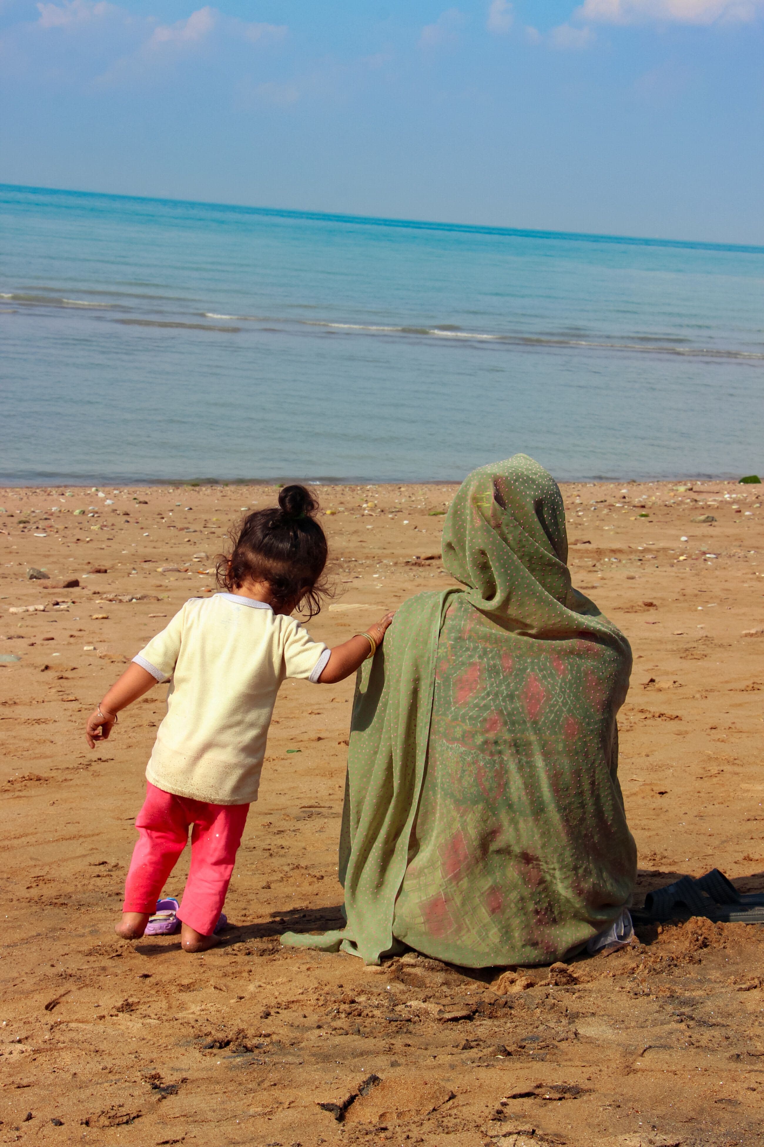 A Mother, A Child, The Sea
